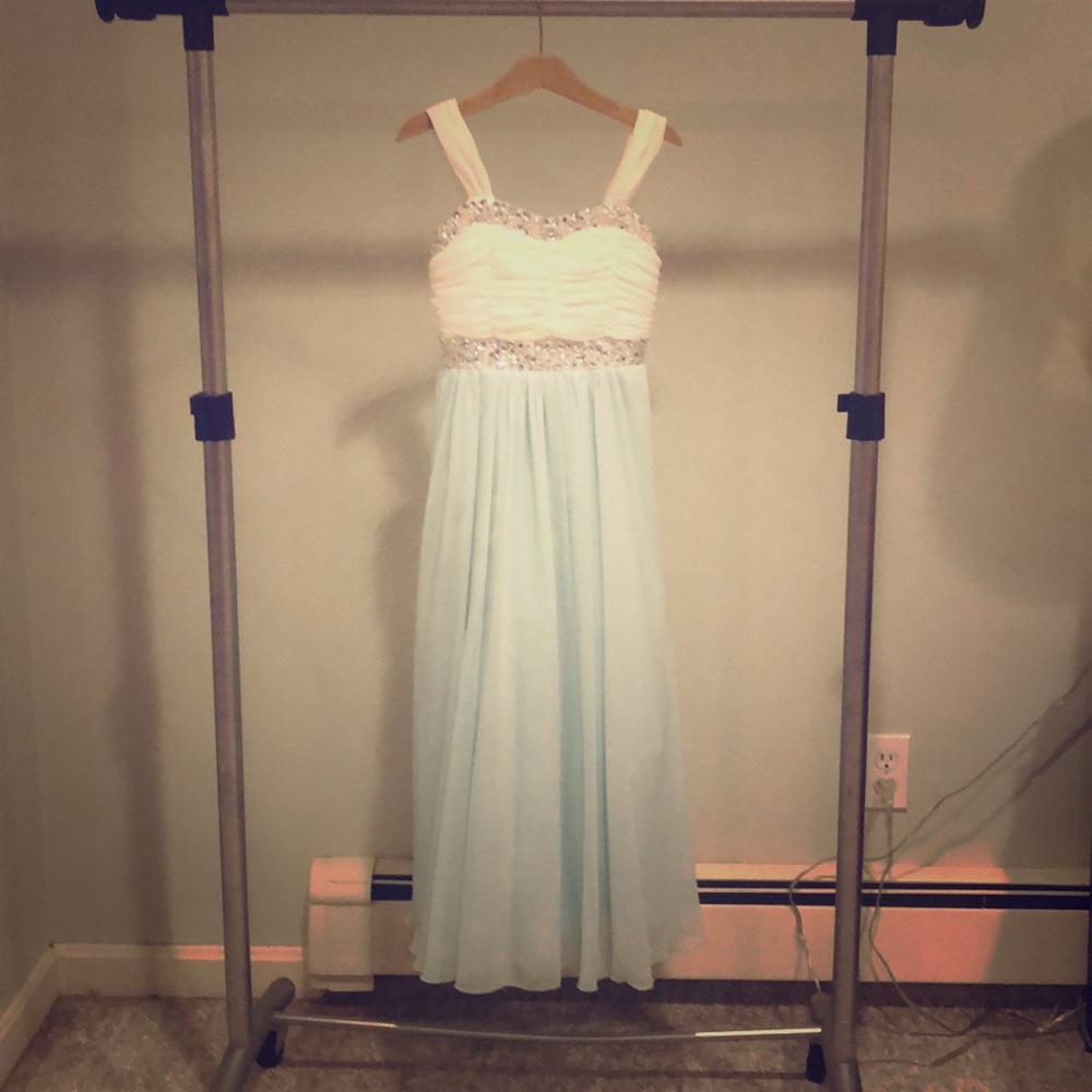 A formal white and turquoise dress